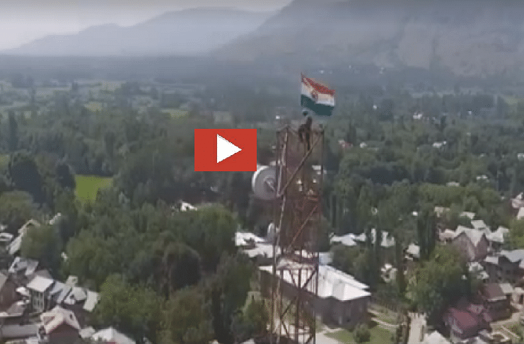indian army jawan climbs on a mobile tower and puts tricolor after removing pak flag